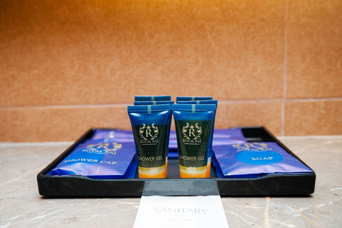 Royal Raj branded soap and toiletries laid out on a marble counter.